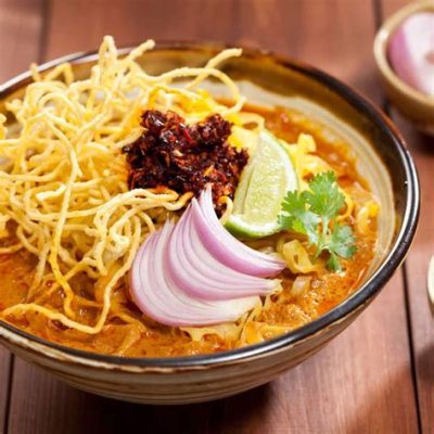  Khao Soi: Een romige curry met knapperige noedels die je smaakpapillen zullen verbazen